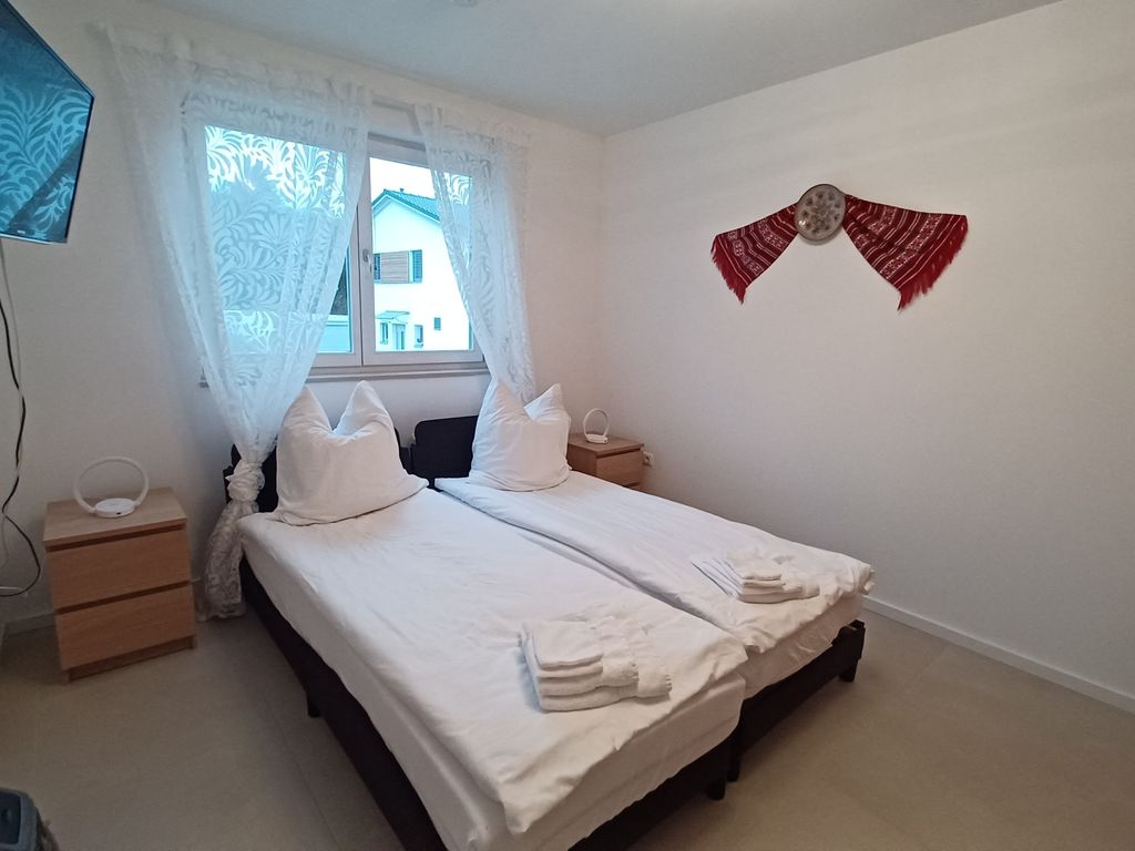 Schlafzimmer 3 mit zwei getrennten Betten
