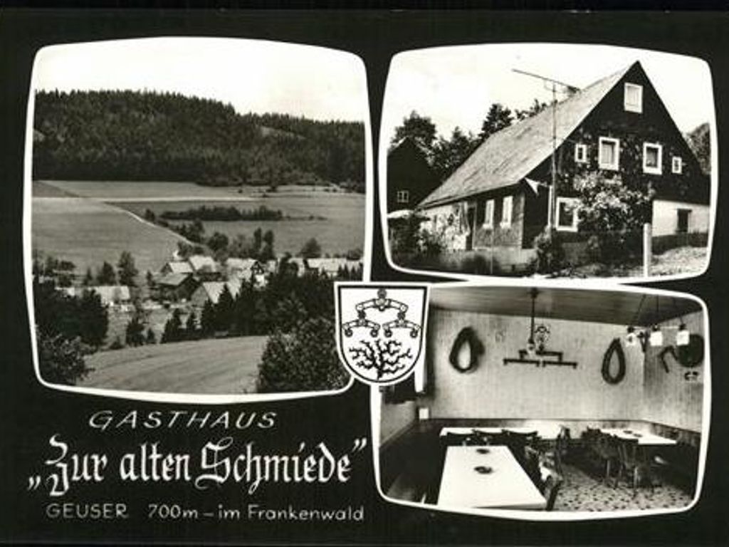 Alte Postkarte mit der Alten Schmiede - das Wahrzeichen der Ortschaft