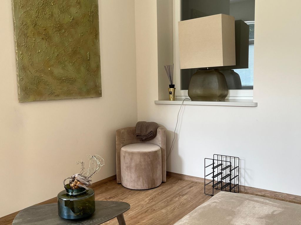 Wohnzimmer in der Ferienwohnung Pure Highlight Living 9 in Steinfurt
