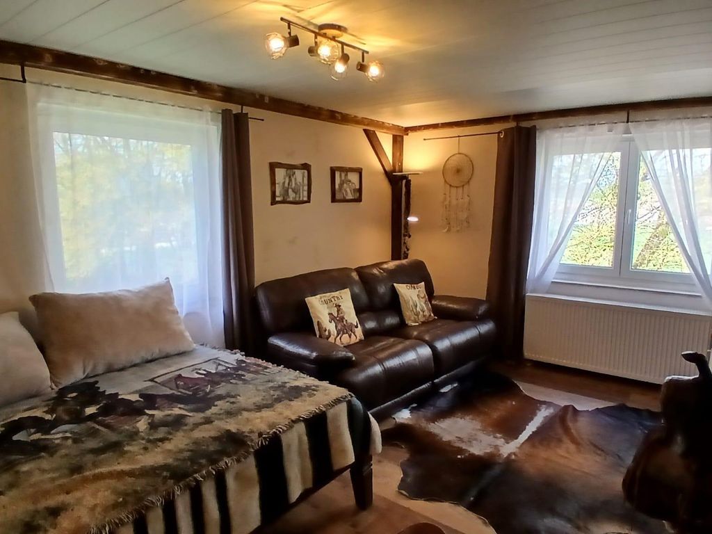 Wohnzimmer mit Bett