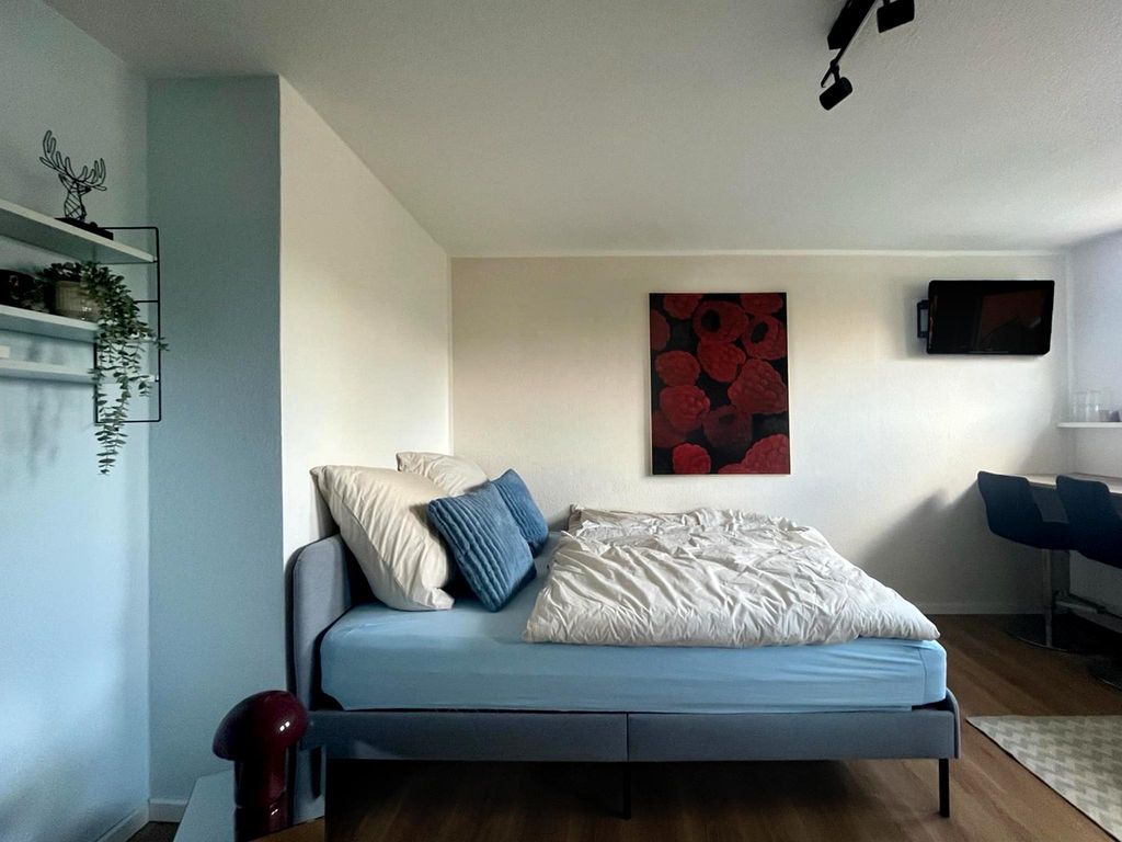 Wohnraum und Bett