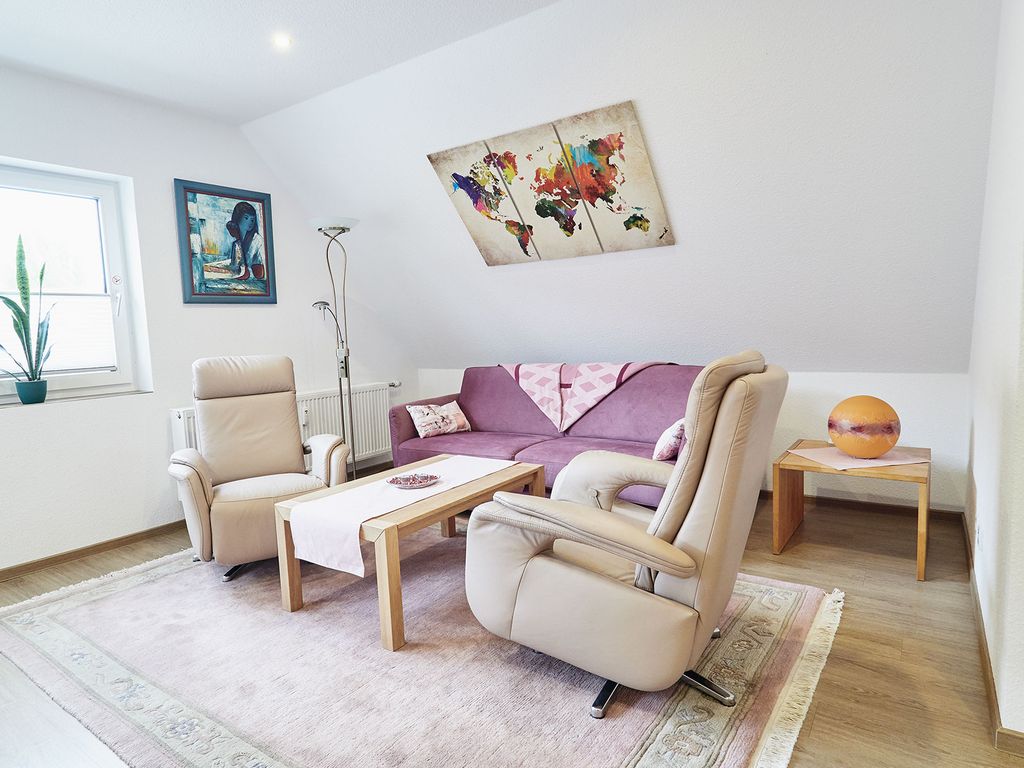 Wohnzimmer in der Ferienwohnung Warendorf 12