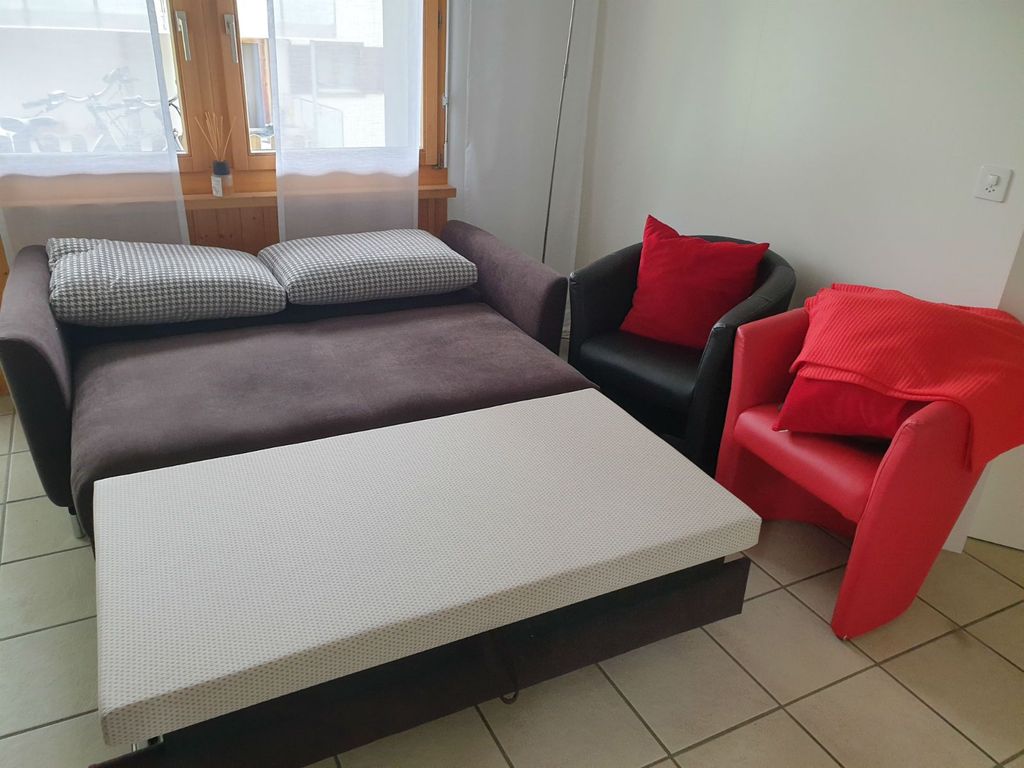 Ferienwohnung Davos Caplan Ledermann - Schlafcouch