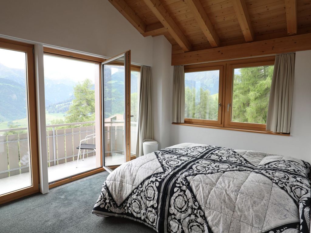 Ferienhaus Davos Munts - Schlafzimmer 1