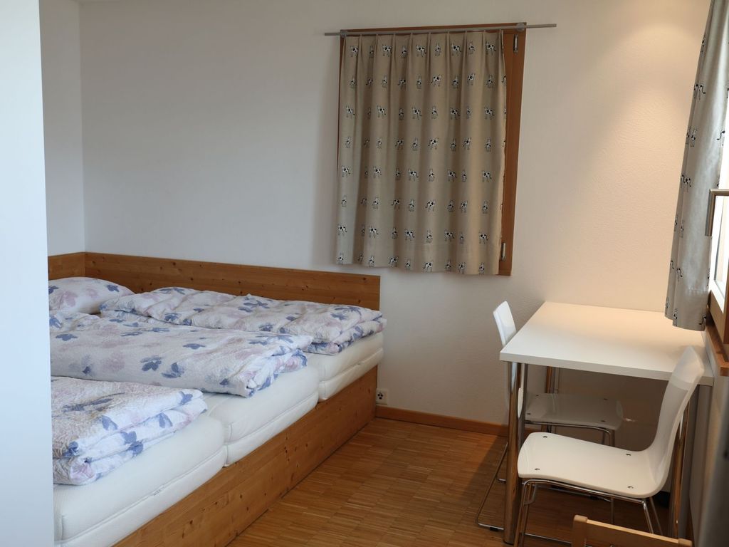 Ferienhaus Davos Munts - Schlafzimmer EG