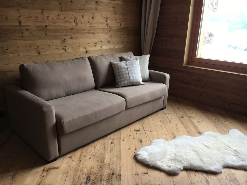 Ferienwohnung Bischu Valtiarm -  Schlafzimmer mit Bettsofa