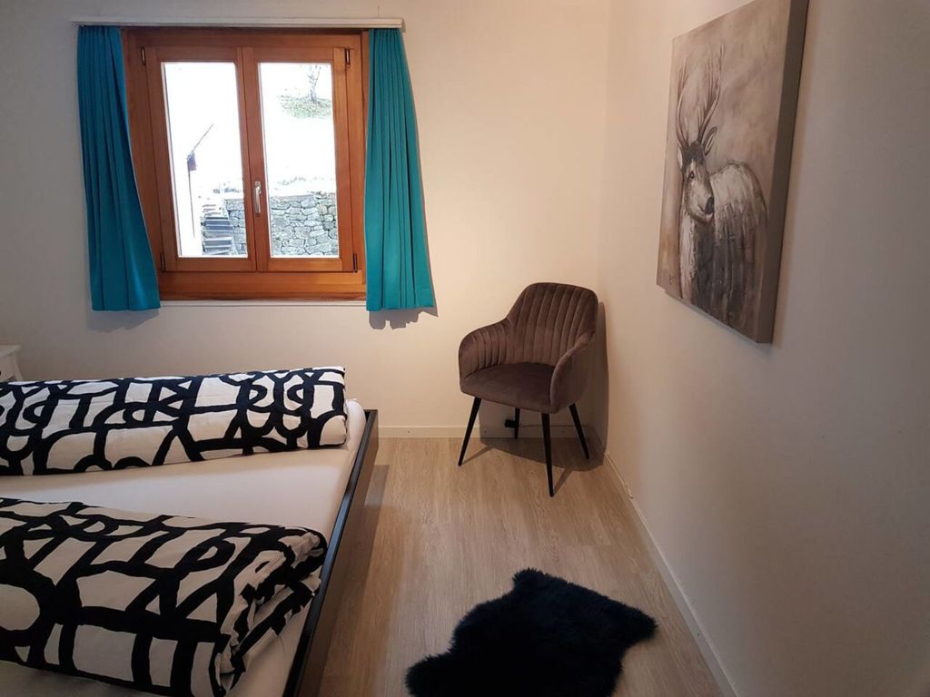 Ferienwohnung Casa Spescha - Schlafzimmer
