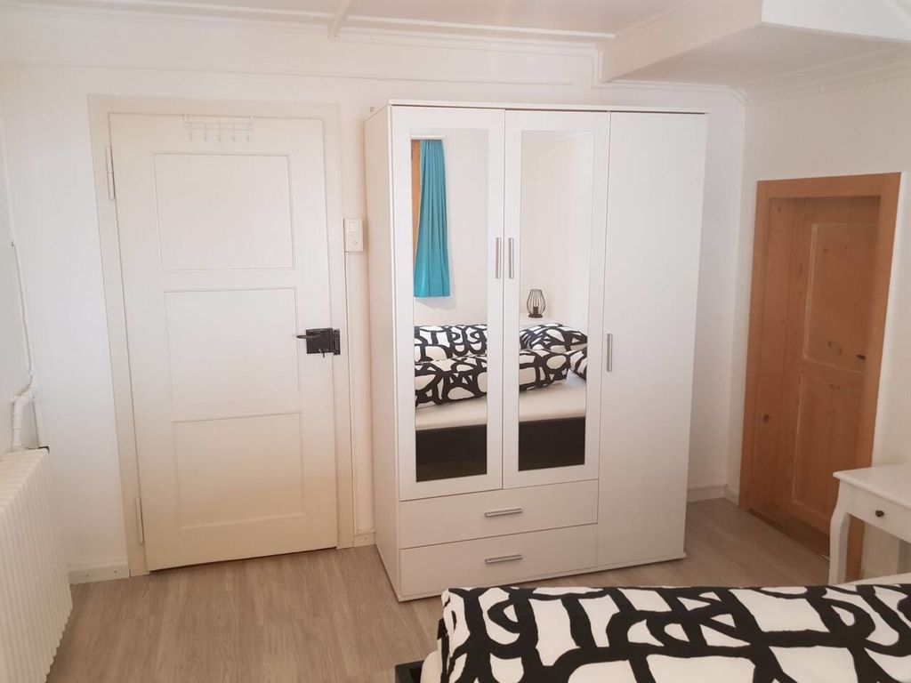 Ferienwohnung Casa Spescha - Schlafzimmer
