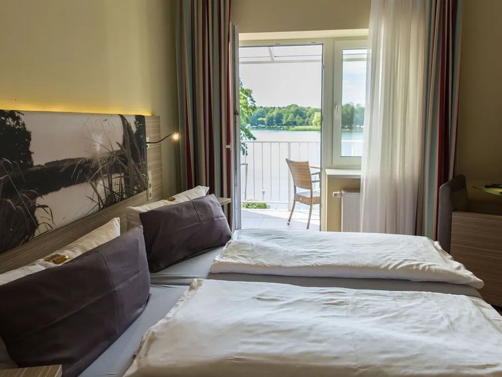 Doppelzimmer Komfort mit Balkon und Seeblick