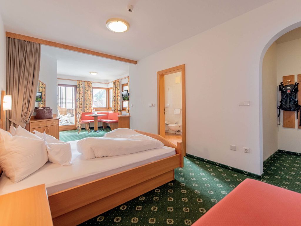 Junior Suite Arnika - Zimmer - Hotel Trenker - Prags