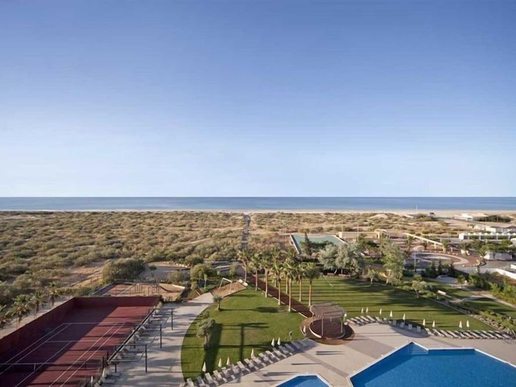 Ozadi Altura Beach Resort