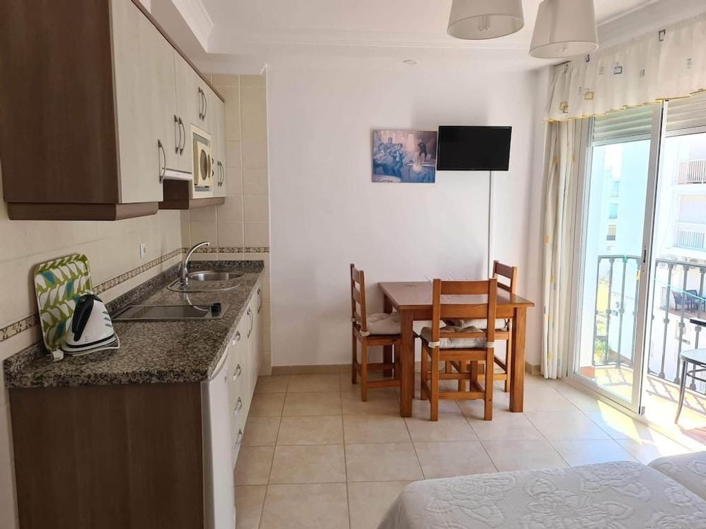 Apartamentos El Barrio