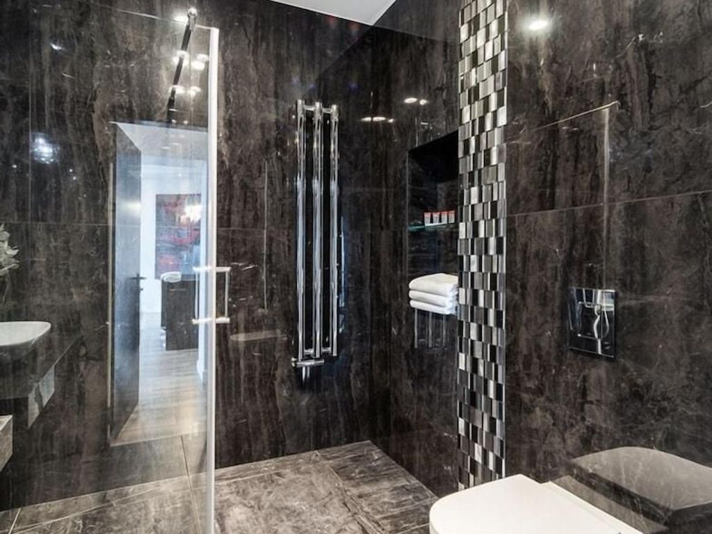 Apartamenty Sky Tower z wanną przy oknie