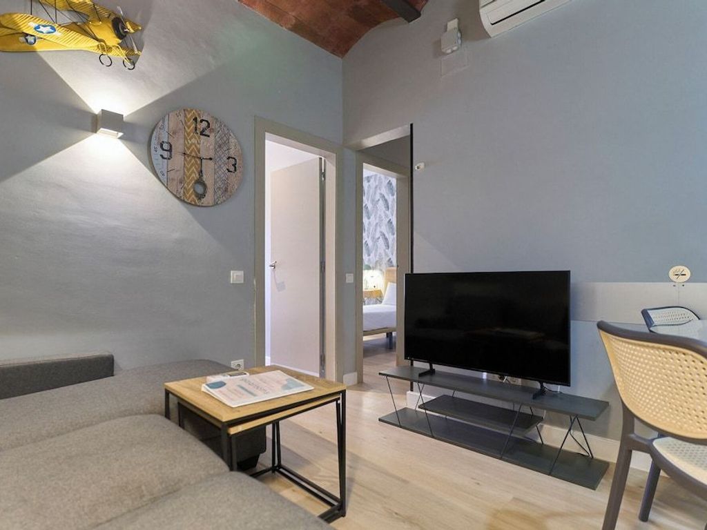 Fira Centric Apartments by gaiarooms