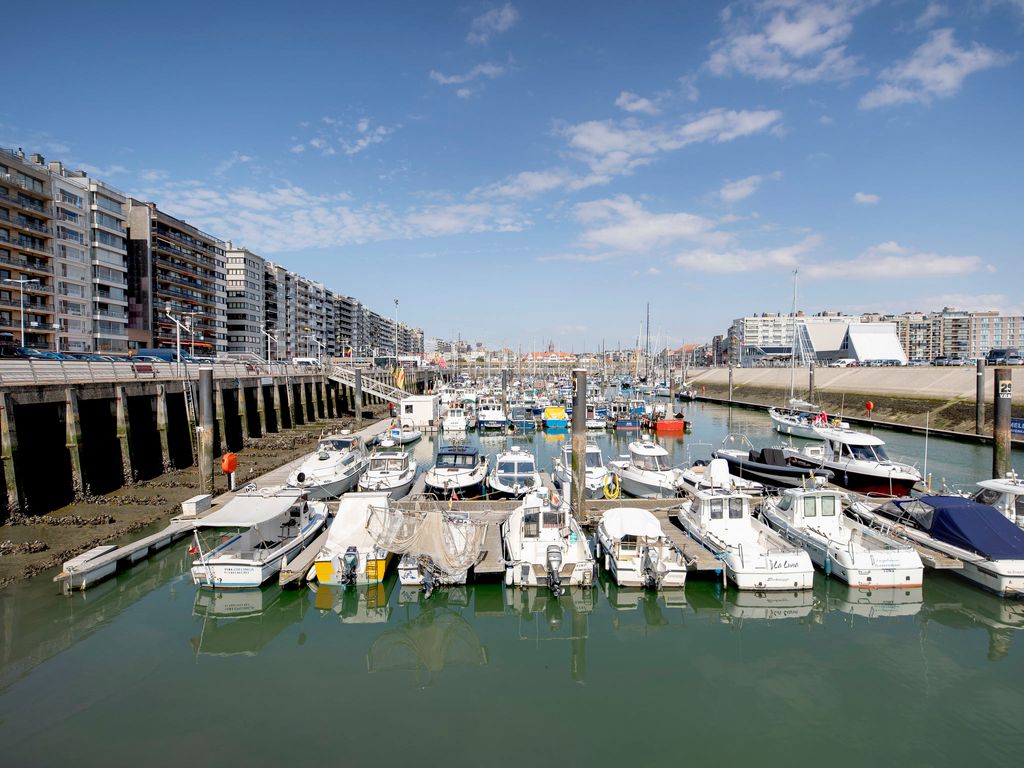Bella III with harbour view