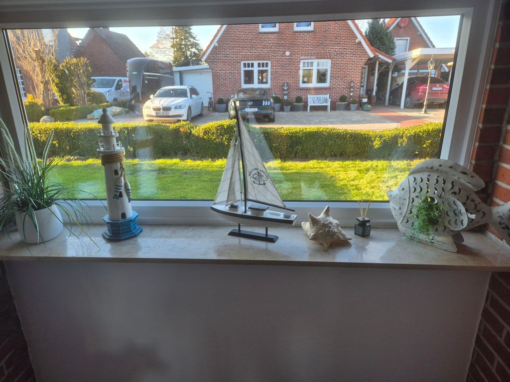 mit Wintergarten und Garten am Deich