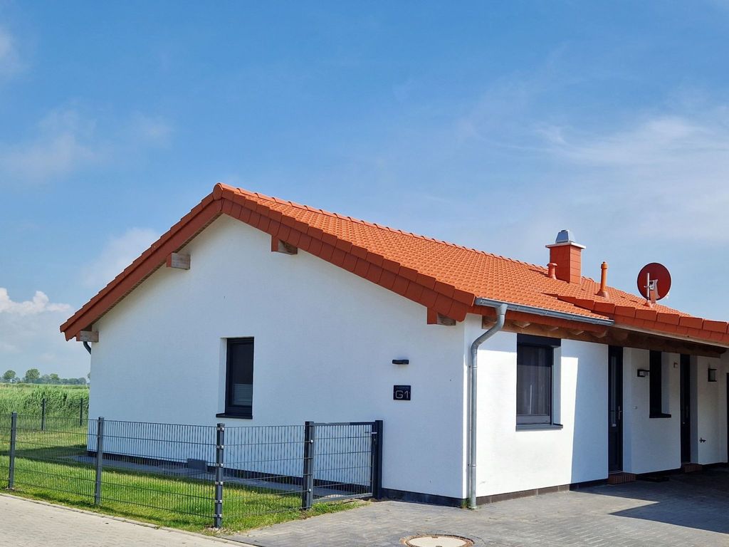 G1 Eingezäuntes Haus mit Kamin in Eckwarderhörne