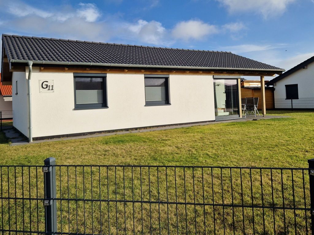 G11 Eingezäuntes Neubau-Haus in Eckwarderhörne