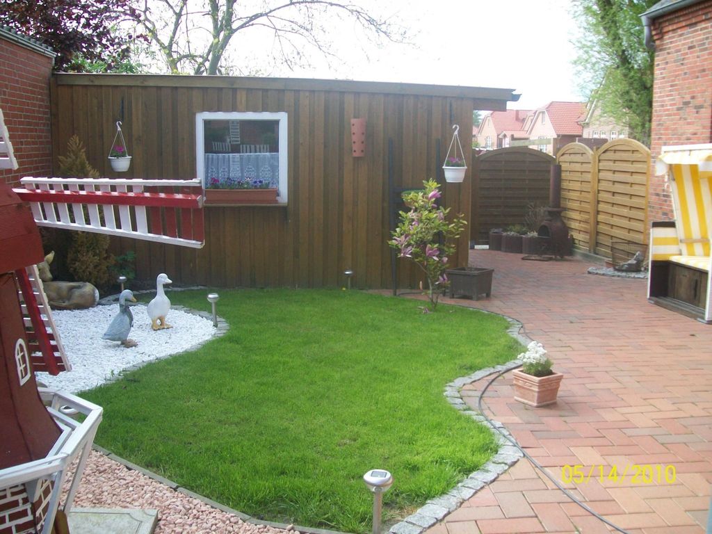 mit umfriedetem Garten und Terrassen