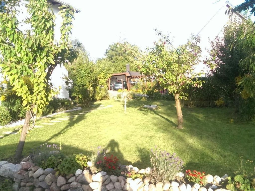 Familienfreundliche Wohnung in Vorland mit Garten