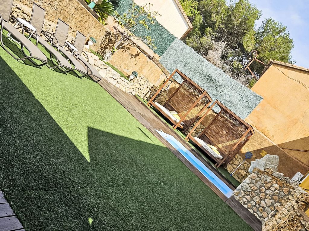 in Can Trabal mit Garten und Grill