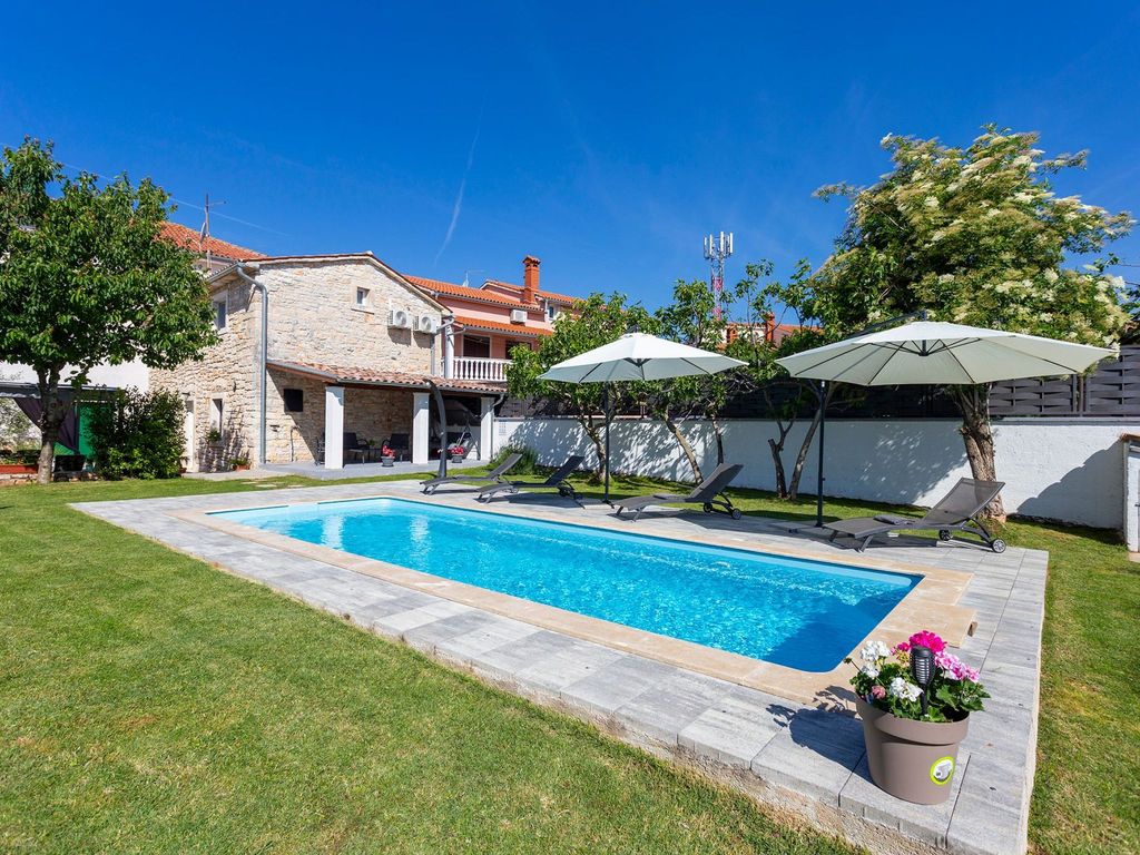 Haus Furlani mit schönem Garten und privatem Poo