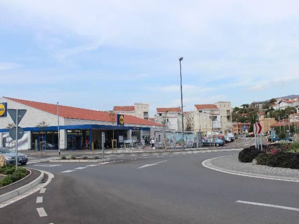 Wohnung in Novi Vinodolski mit Gemeinsamem Garte