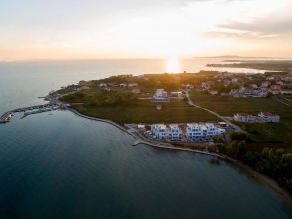 Strandvilla "Miri Olive" mit beheiztem Pool