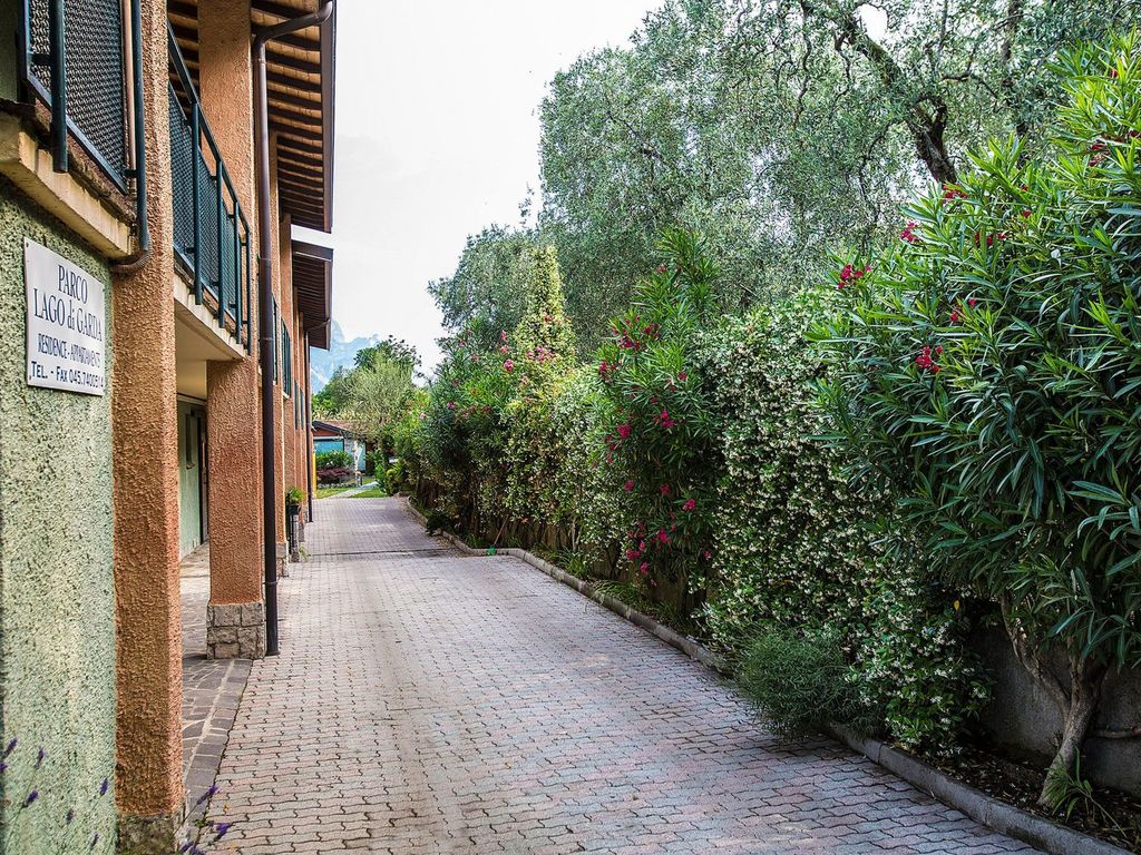 Zwei-Zimmer-Wohnung mit Seeblick, Grill und Gemeinschaftspool