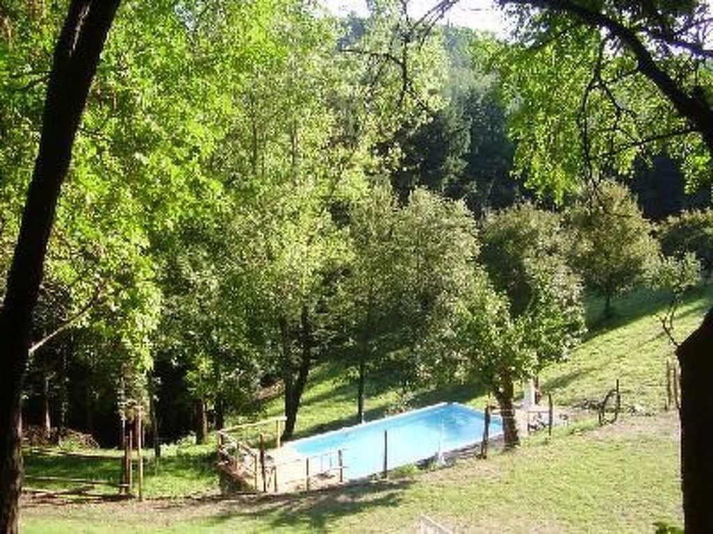 Appartement mit Grill, gemeinsamem Pool und Garten