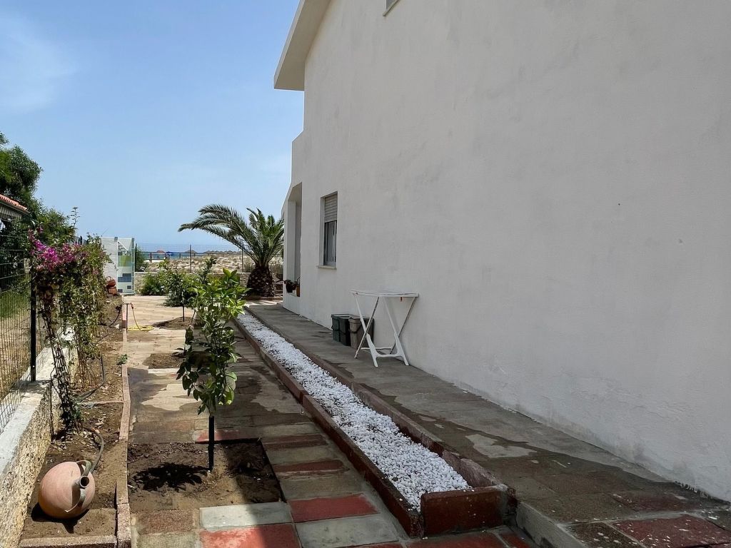 Haus in La Caletta mit Garten und Grill