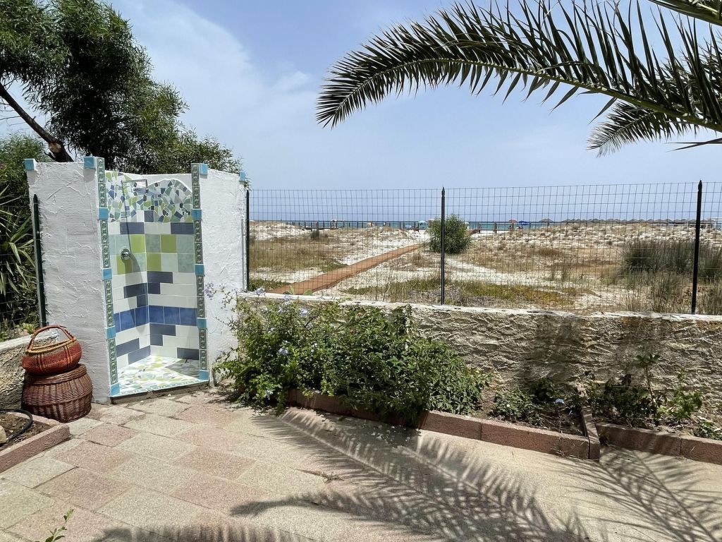 Haus in La Caletta mit Garten und Grill