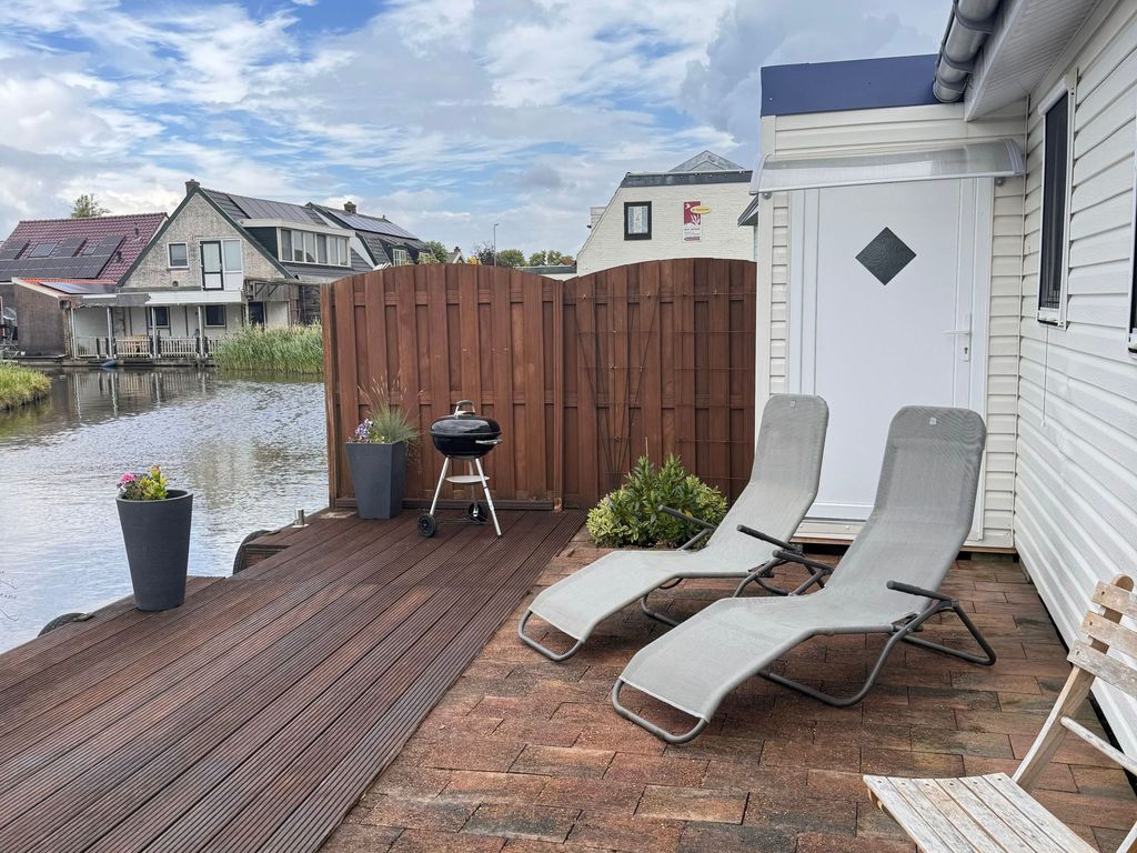 Ela mit Holzgrill, Garten und Terrasse