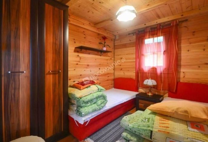 Gemütliches Holzferienhaus mit Grill und Garten .1