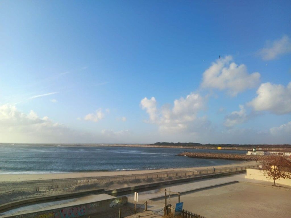 Mit den Füßen im Sand