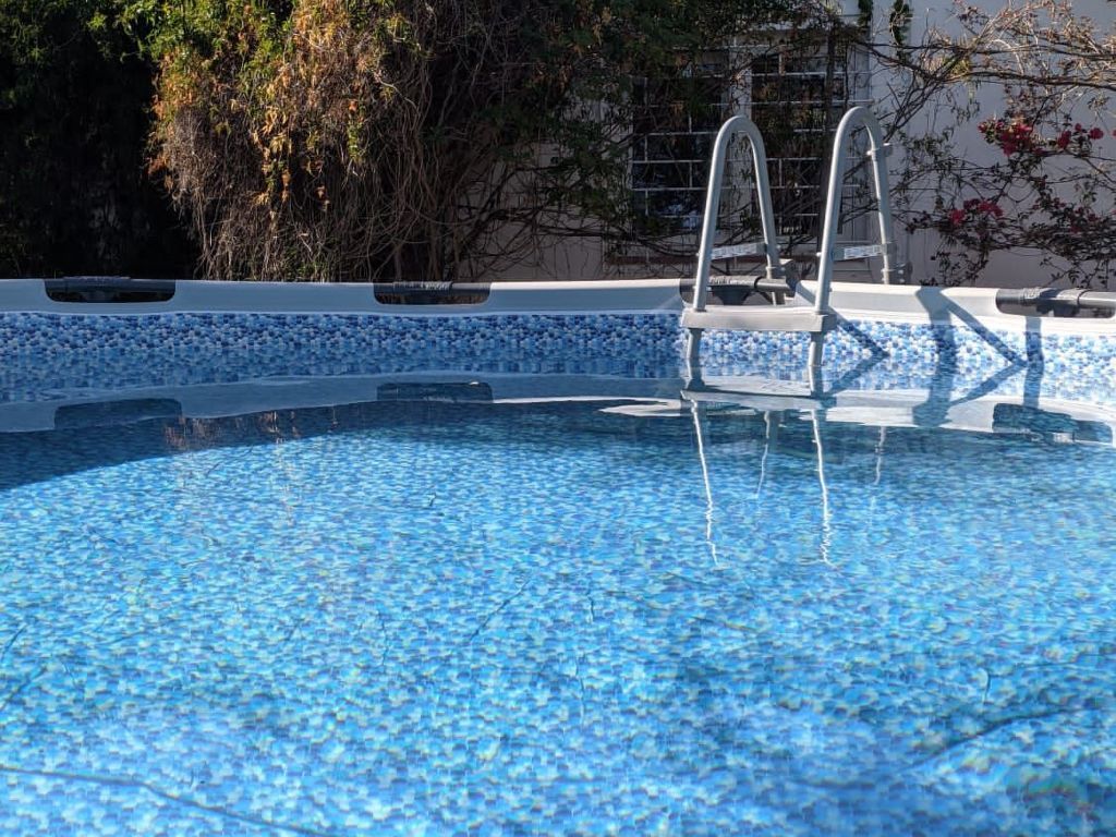 mit Pool und 5 Schlafzimmern für 10 Personen.