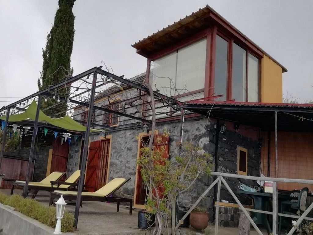 Haus in Arco Da Calheta mit Garten und Meerblick