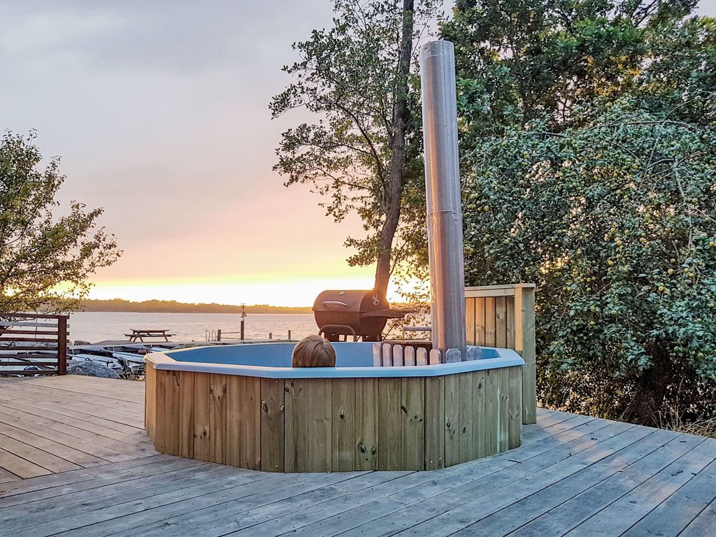 Holzhaus mit überdachter Terrasse