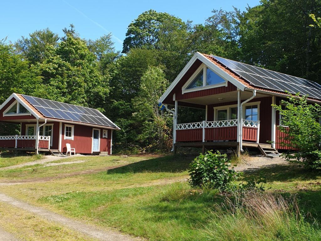 Holzhaus mit überdachter Terrasse