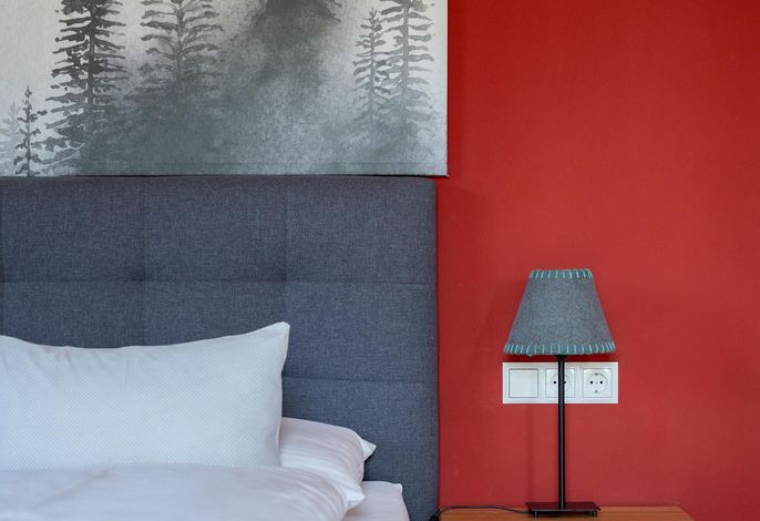 Deluxe Doppelzimmer mit Schlafsofa und Balkon