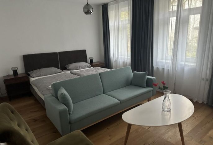 Café Cup - Appartements mit Garten