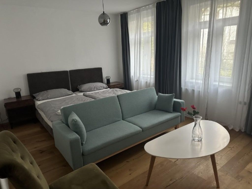 Café Cup - Appartements mit Garten
