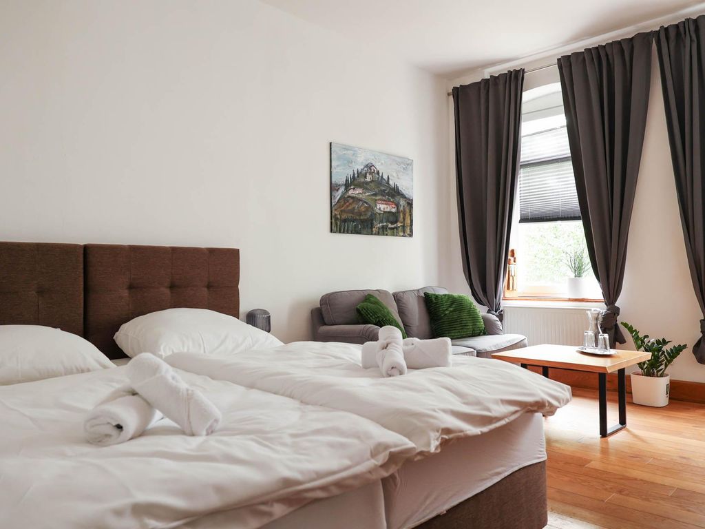 Café Cup - Charmantes Appartement mit Garten