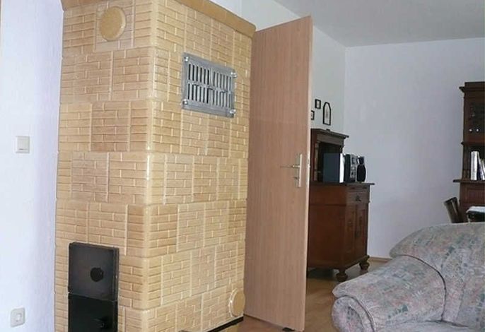 Wohnzimmer mit Kachelofen