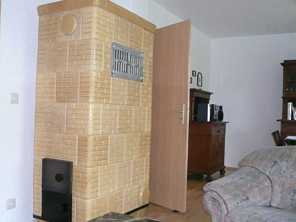 Wohnzimmer mit Kachelofen