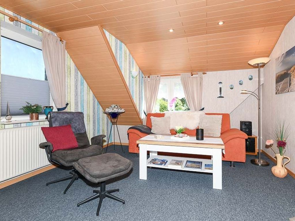 Wohnzimmer mit integriertem Küchenbereich