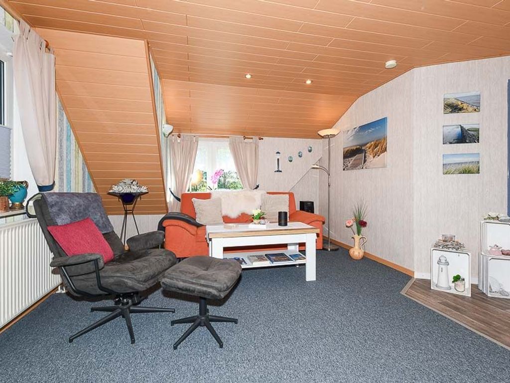 Wohnzimmer mit integriertem Küchenbereich