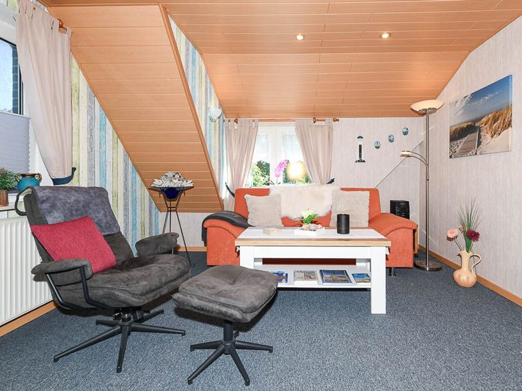 Wohnzimmer mit integriertem Küchenbereich