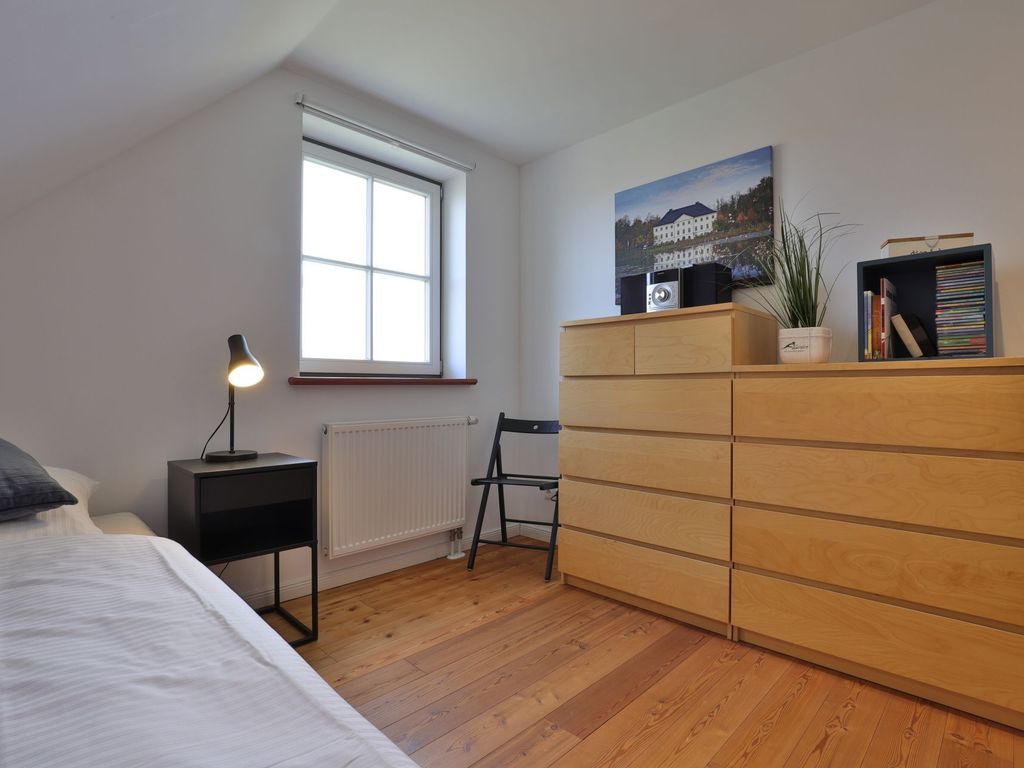 Ruhe-Insel Ferienhaus - Blick in das Schlafzimmer mit 2 Einzelbetten im OG