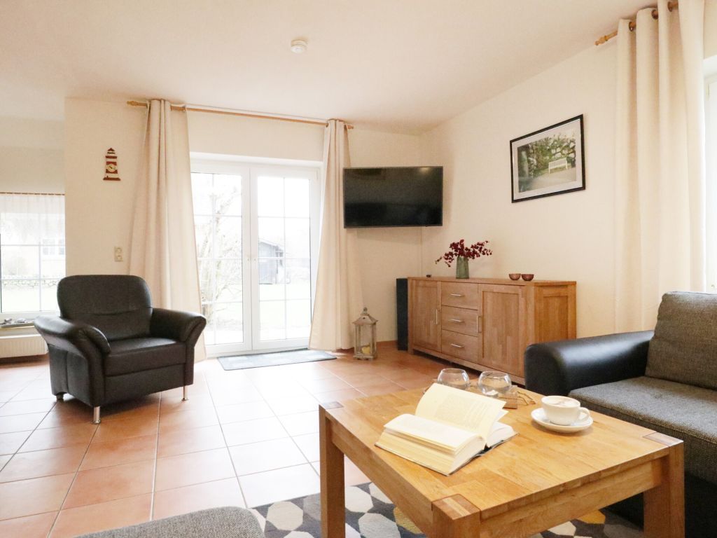 Sonnenblick Ferienhaus - Blick vom Sofa auf den TV